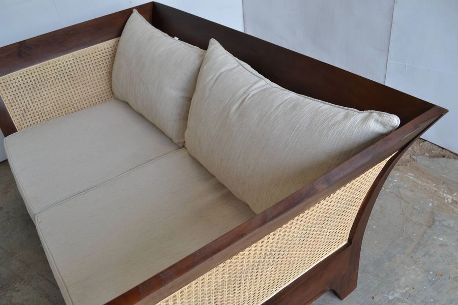 The seat detail of the teak rattan sofa