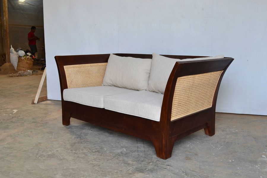 The teak rattan sofa dark brown finish and natural rattan