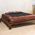 Opium custom bedframe made of teak wood