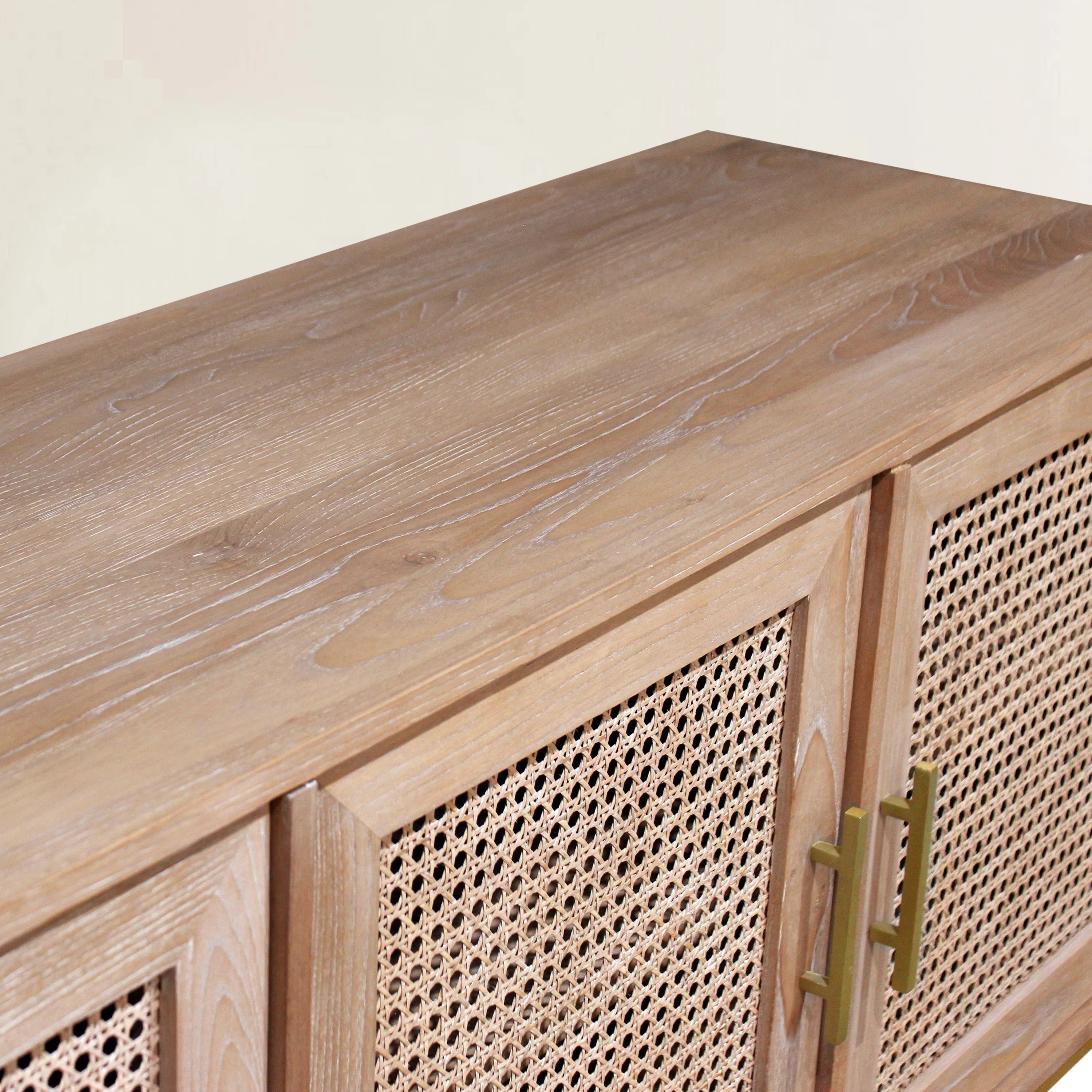 The reclaimed teak wood grains on the buffet top