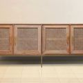 Front side of the Vented buffet reclaimed wood and rattan on aluminum legs