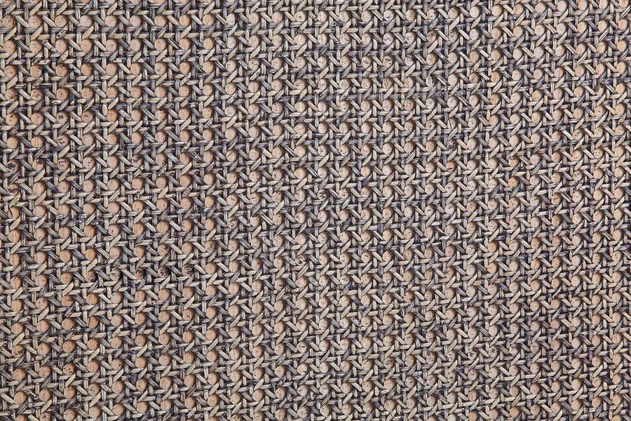 Hole-to-hole strand caning pattern