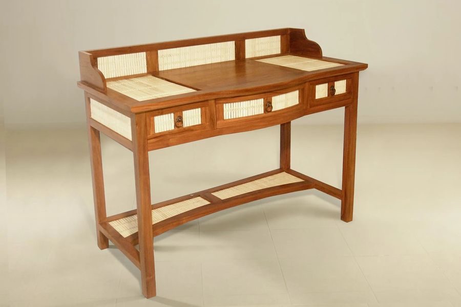 Teak wood desk accented with bamboo wicker panels