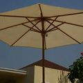 Teak parasol opened