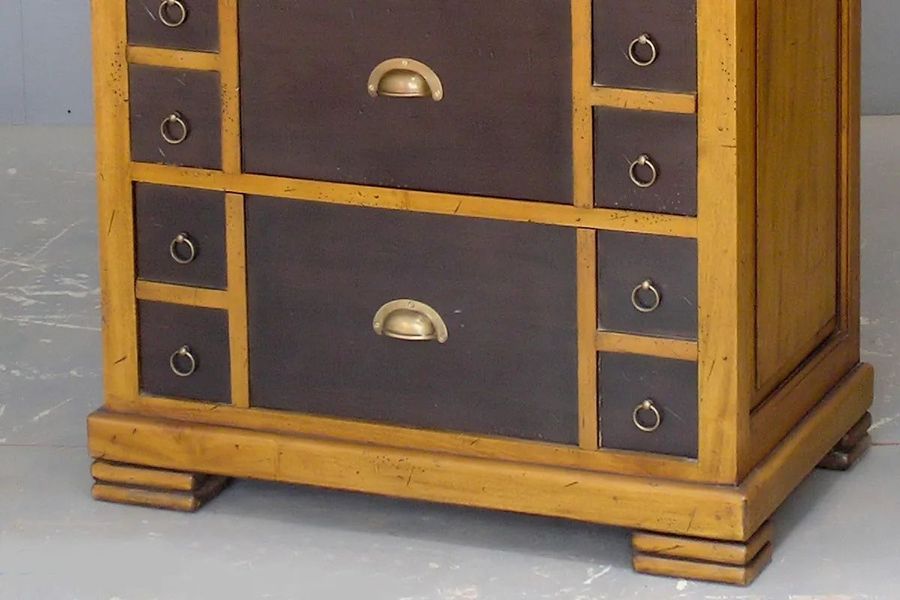 Brass pulls on the drawer front 
