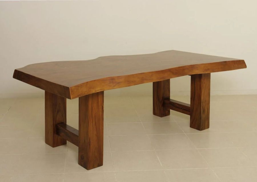 Single block top on extra large legs dining table