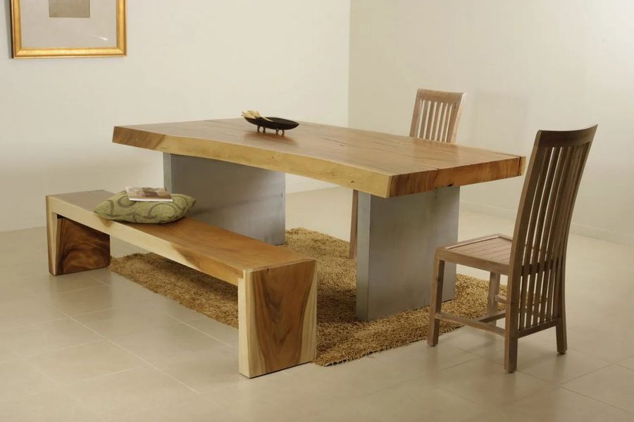 Silver pedestal table in a dining room
