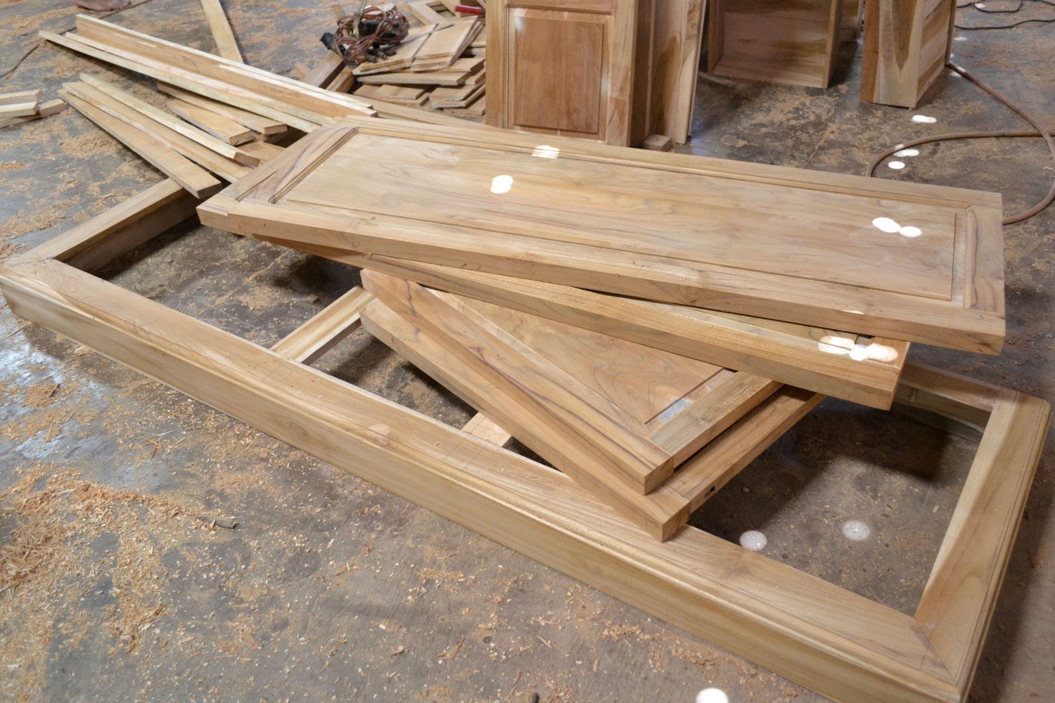 Raised panels floating in solid wood frame